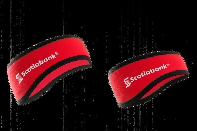 Two red Scotiabank branded armbands with black stripes displayed against a dark background